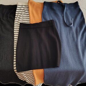 5 skirts - 4 Long knit skirts and 1 mini - all size small/medium (snug).